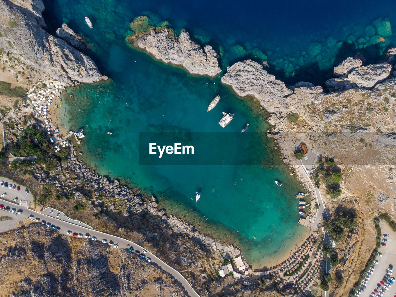 Top view of bay with azure sea, highlands on summer.