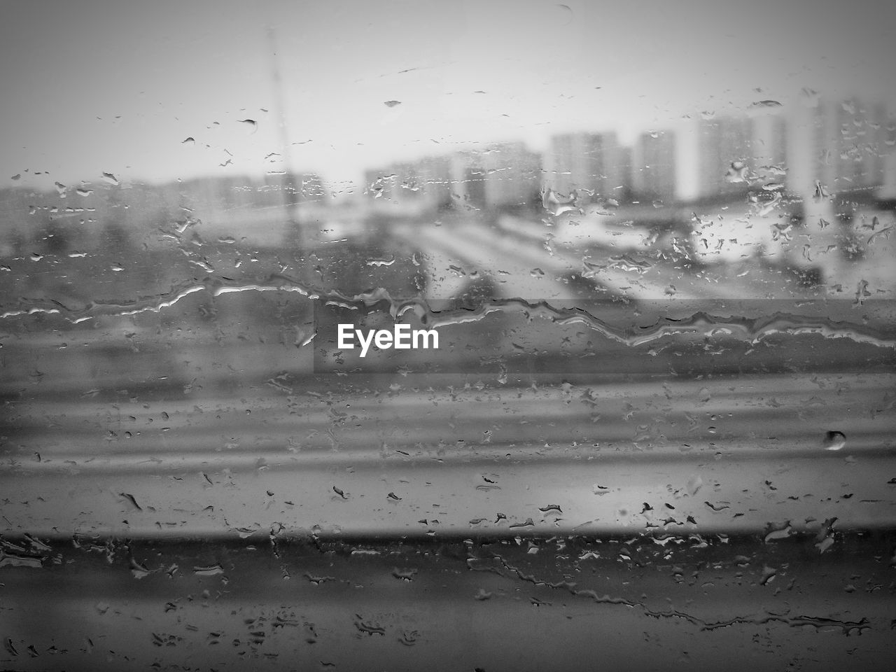 WATER DROPS ON GLASS WINDOW