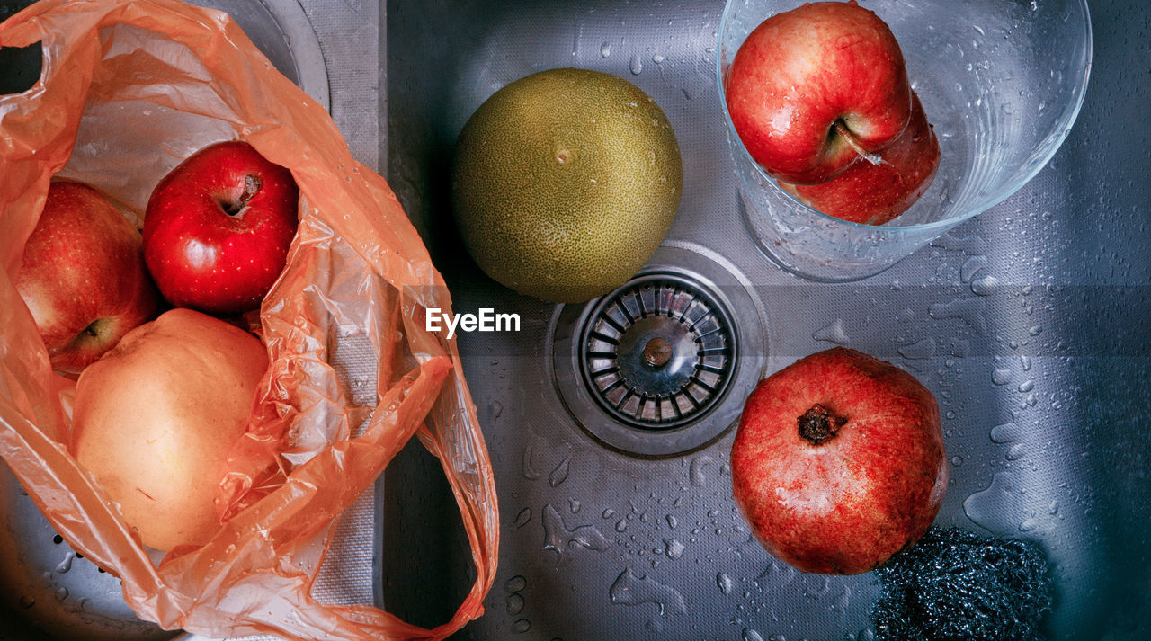 The fruit is in the sink