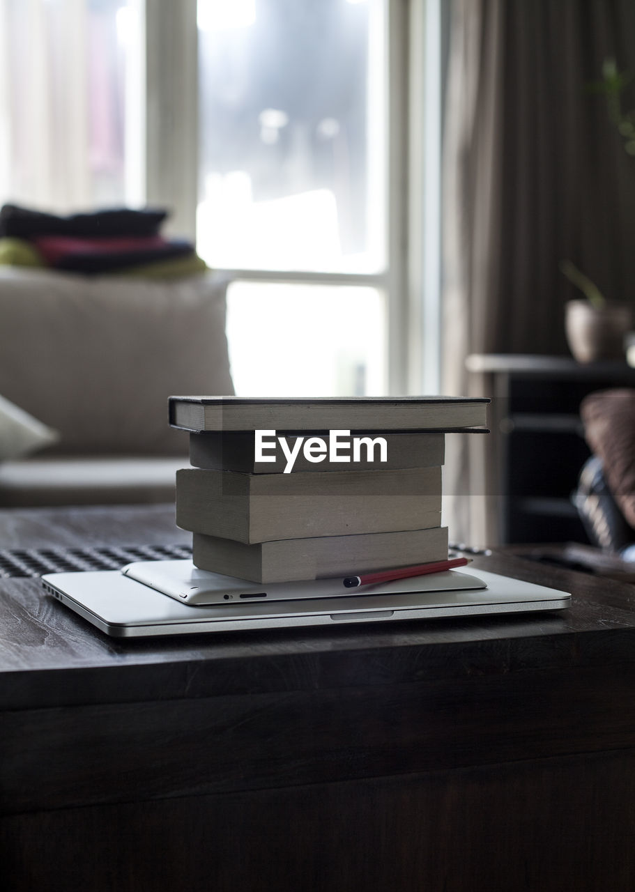 Books and technologies on table