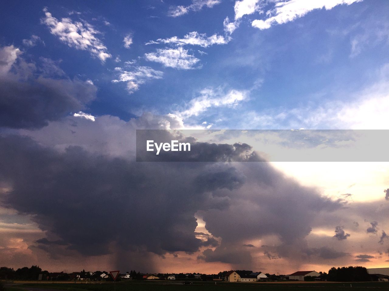 SCENIC VIEW OF SKY OVER LANDSCAPE AGAINST SUNSET