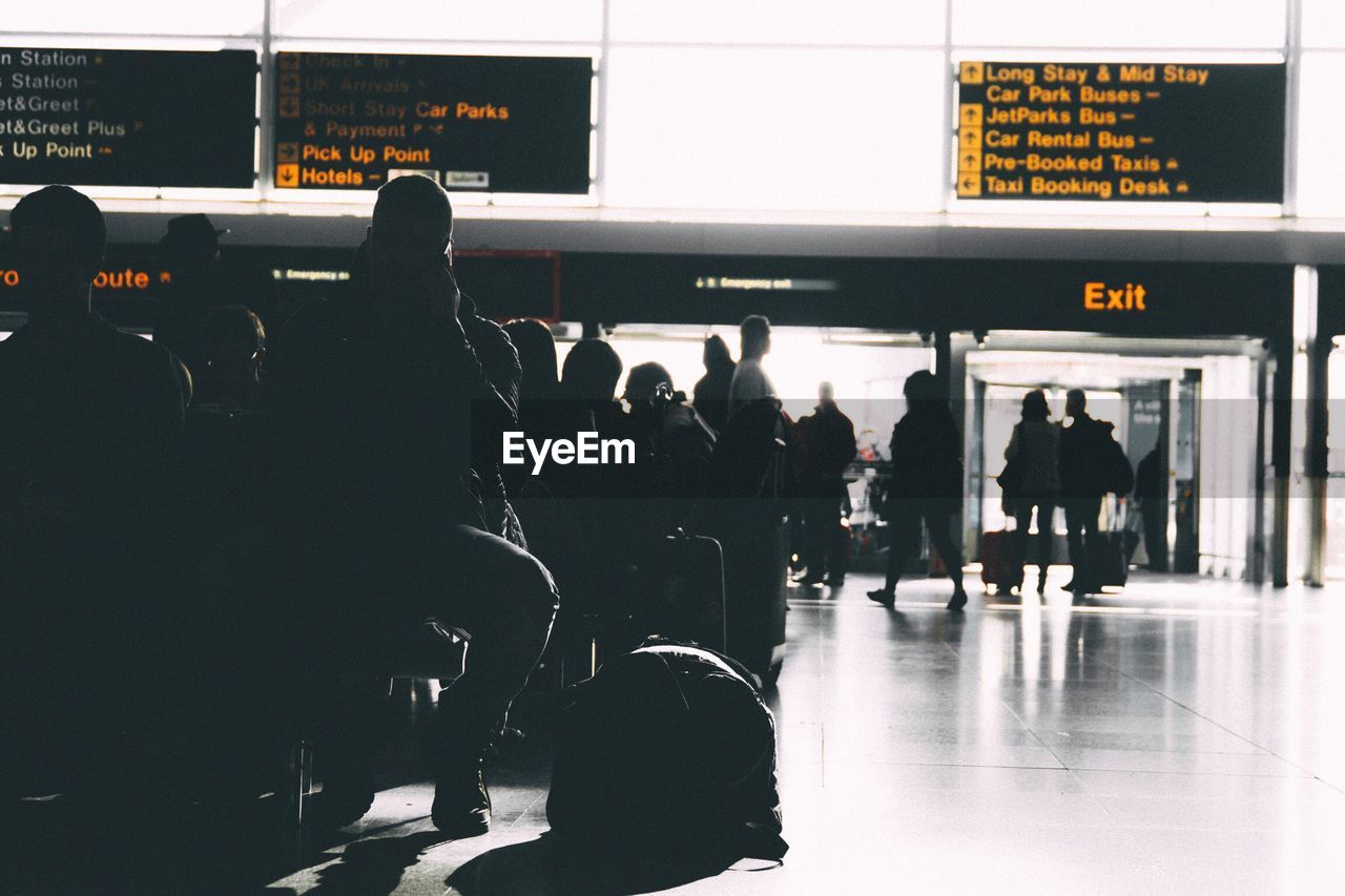 People at railroad station platform