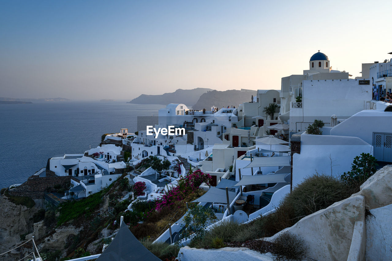 High angle view of buildings in city. santorini