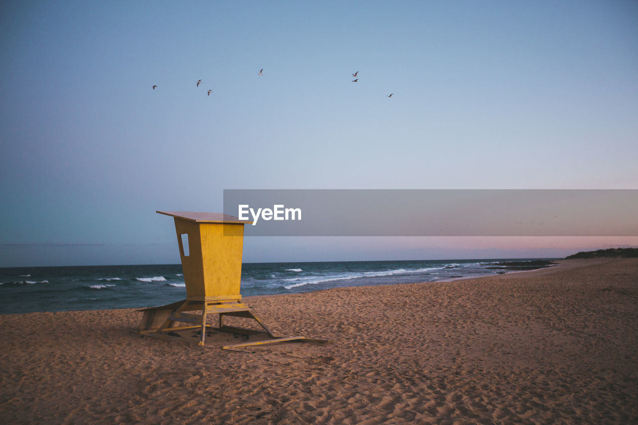 Scenic view of beach and sea against sky