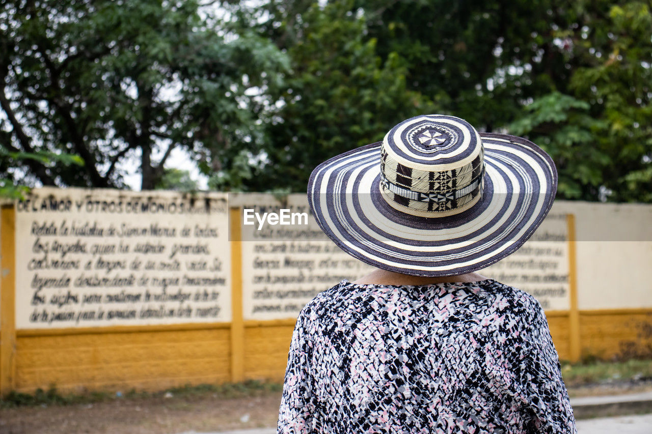 Senior woman tourist at the macondo linear park in aracataca. 