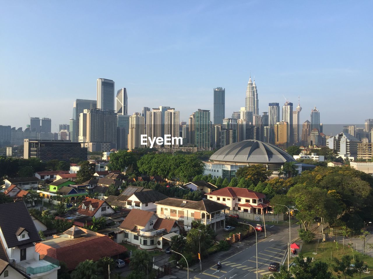 Buildings in city against sky