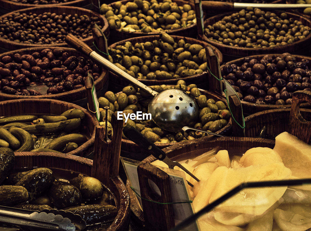 food and drink, food, large group of objects, container, abundance, variation, no people, basket, market, freshness, retail, for sale, market stall, healthy eating, business, still life, indoors, arrangement, wellbeing, produce, spice, high angle view