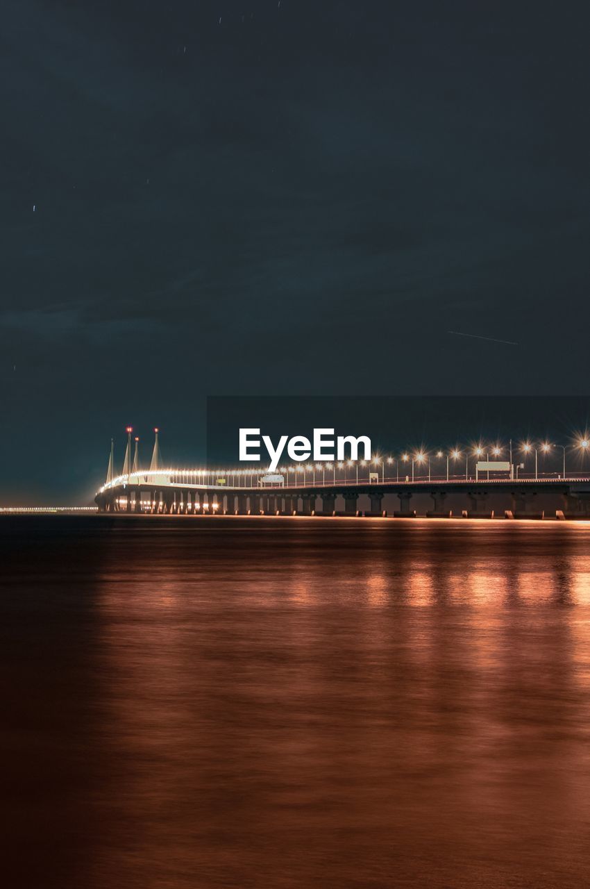 Illuminated bridge over sea against sky at night ,
penang second bridge 