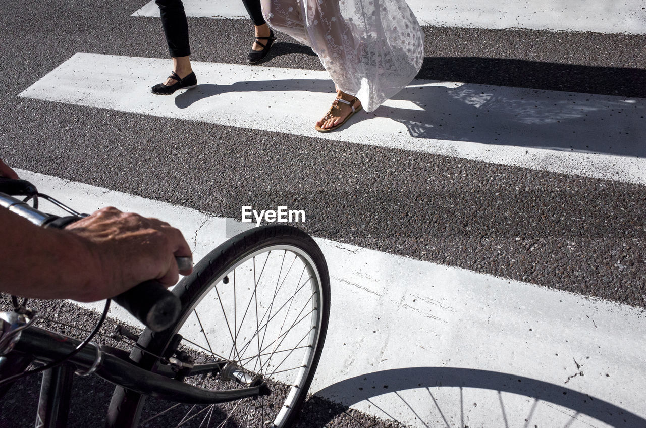 People walking on zebra crossing