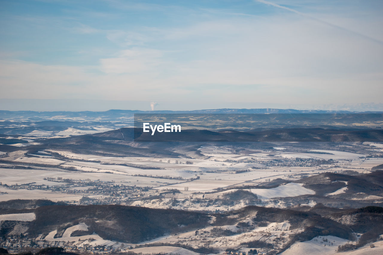 snow, scenics - nature, environment, mountain, winter, sky, beauty in nature, cloud, nature, cold temperature, landscape, mountain range, tranquility, tranquil scene, no people, aerial view, aerial photography, ice, day, non-urban scene, high angle view, outdoors, horizon, idyllic, land, travel, remote