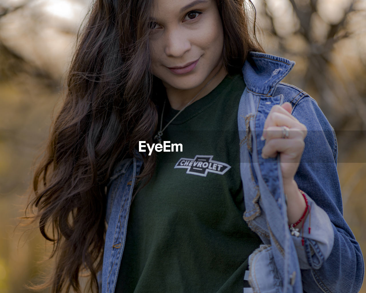 Portrait of woman wearing denim jacket