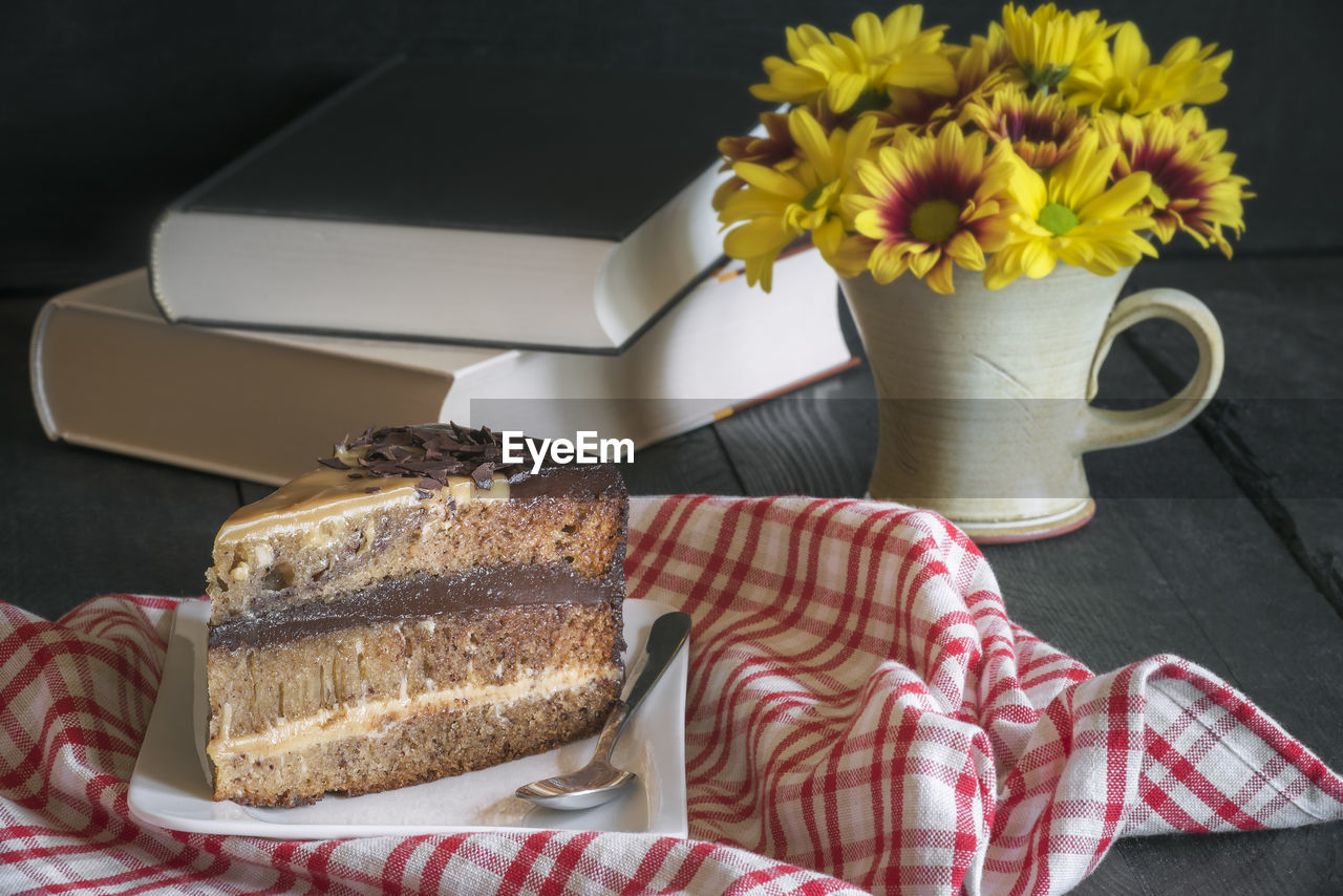 Close-up of cake slice in plate on table