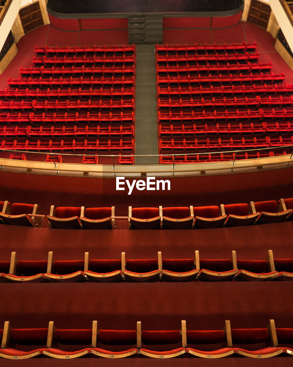 The red armchairs of a theater