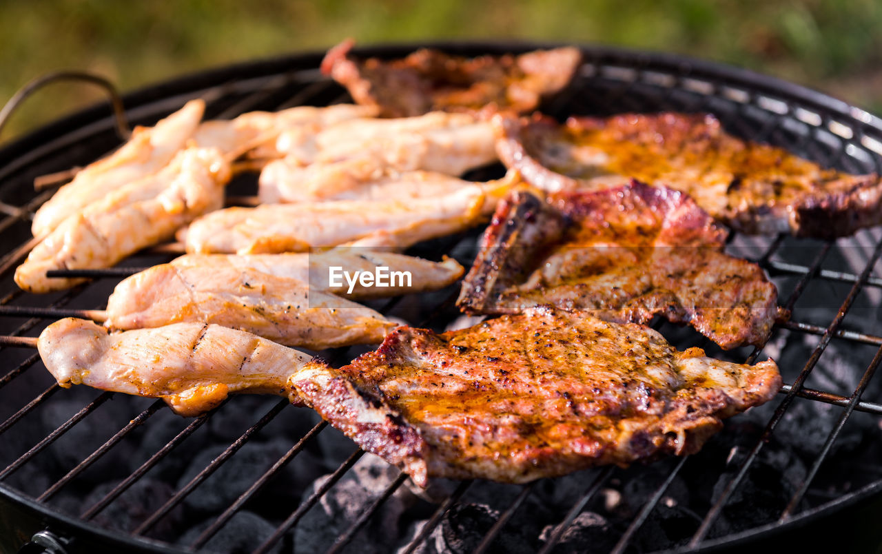 Close-up of meat on barbecue grill