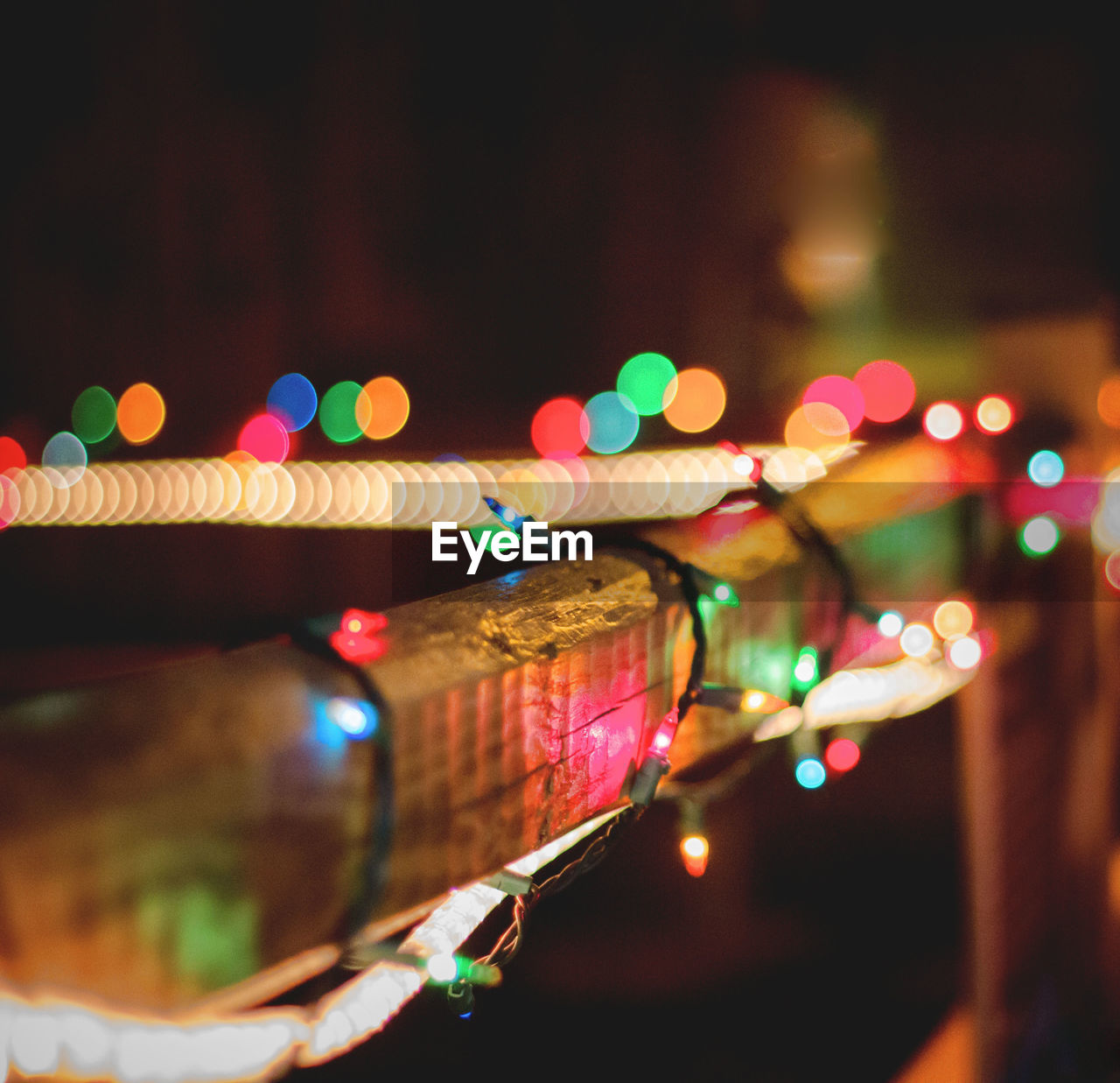 Close-up of illuminated christmas lights at night