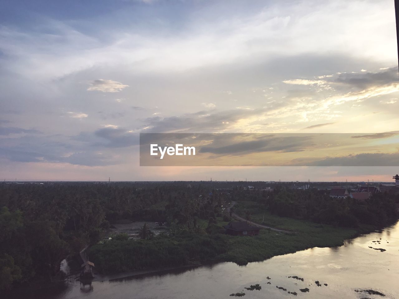 SCENIC VIEW OF RIVER BY LANDSCAPE AGAINST SKY