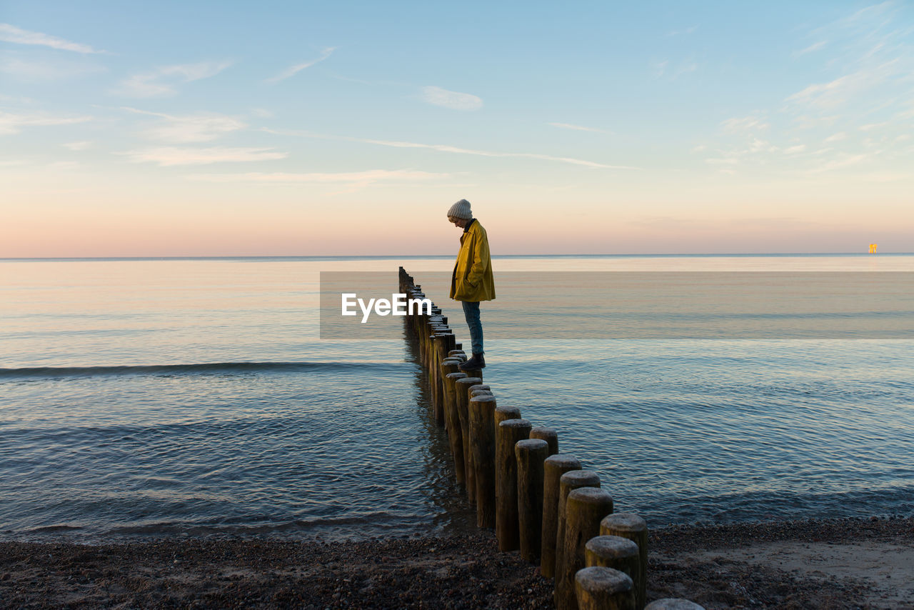 Woman in introspection at seaside