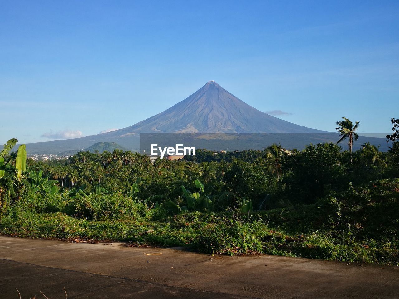 Scenic view of mountains against clear blue sky