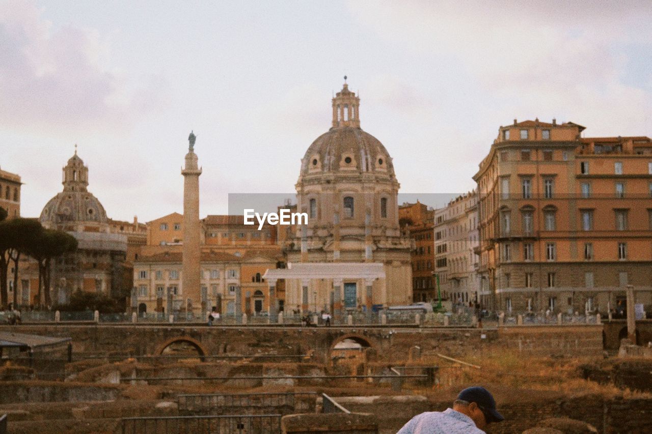 architecture, built structure, building exterior, travel destinations, landmark, travel, history, ancient history, tourism, the past, religion, city, dome, sky, building, nature, place of worship, belief, ancient, spirituality, palace, tourist, adult, cloud, outdoors, men, group of people, cityscape, temple, lifestyles, day