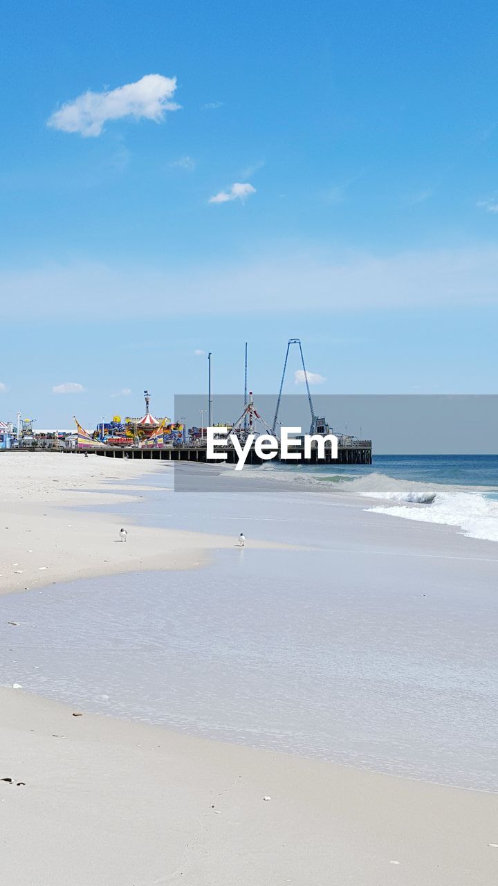 Scenic view of beach against sky