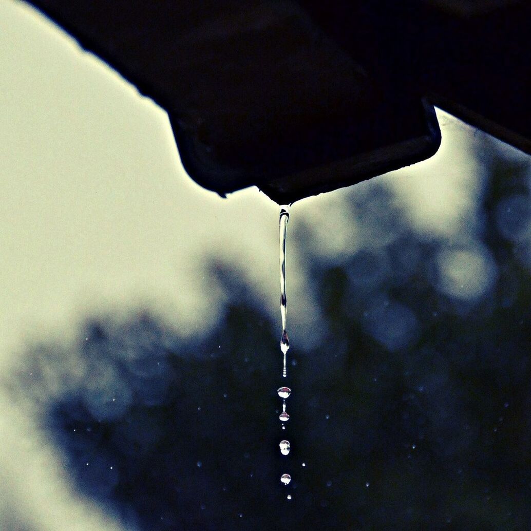 Water dripping from silhouette structure