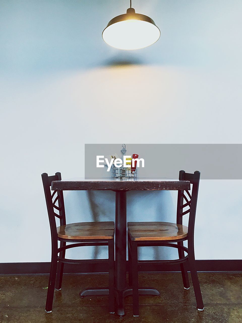 Table and chairs in restaurant