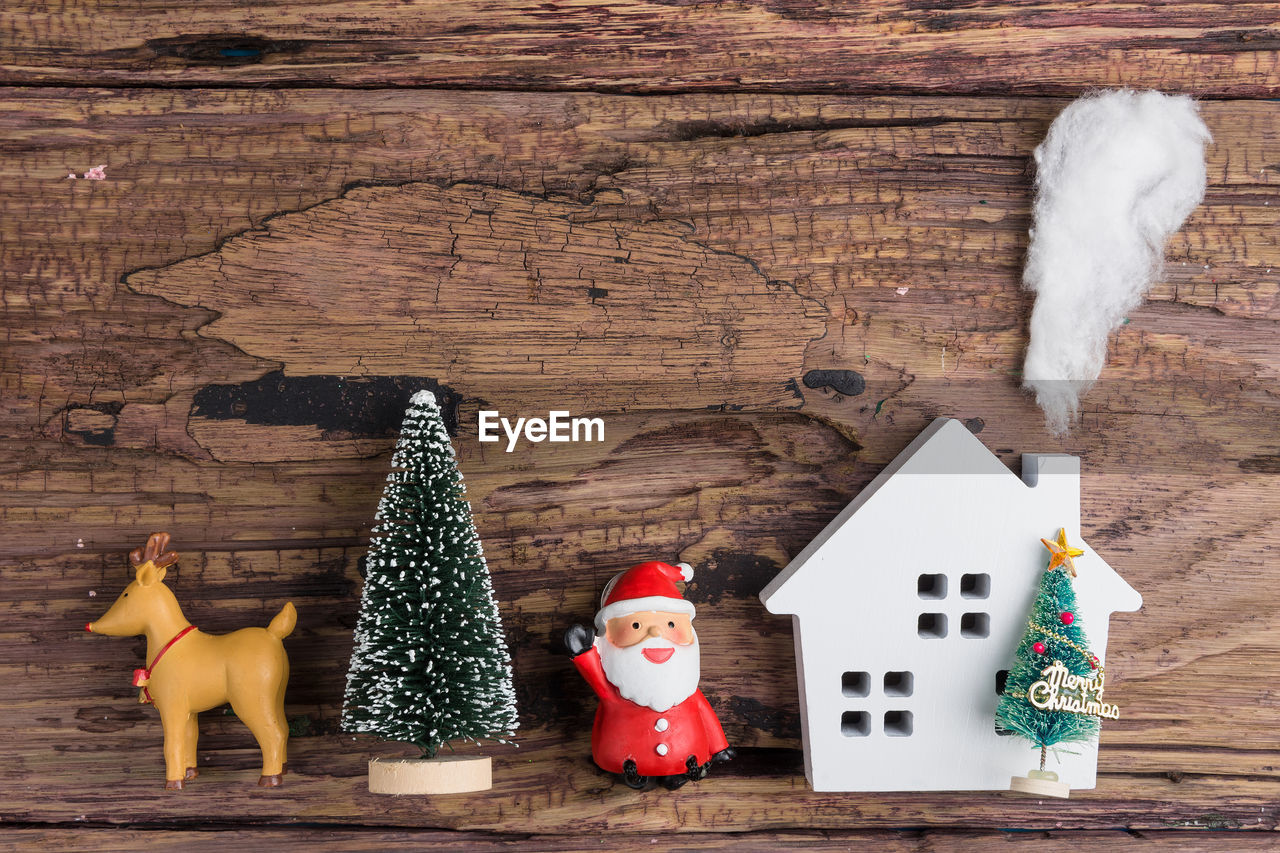 High angle view of christmas decorations on wooden table