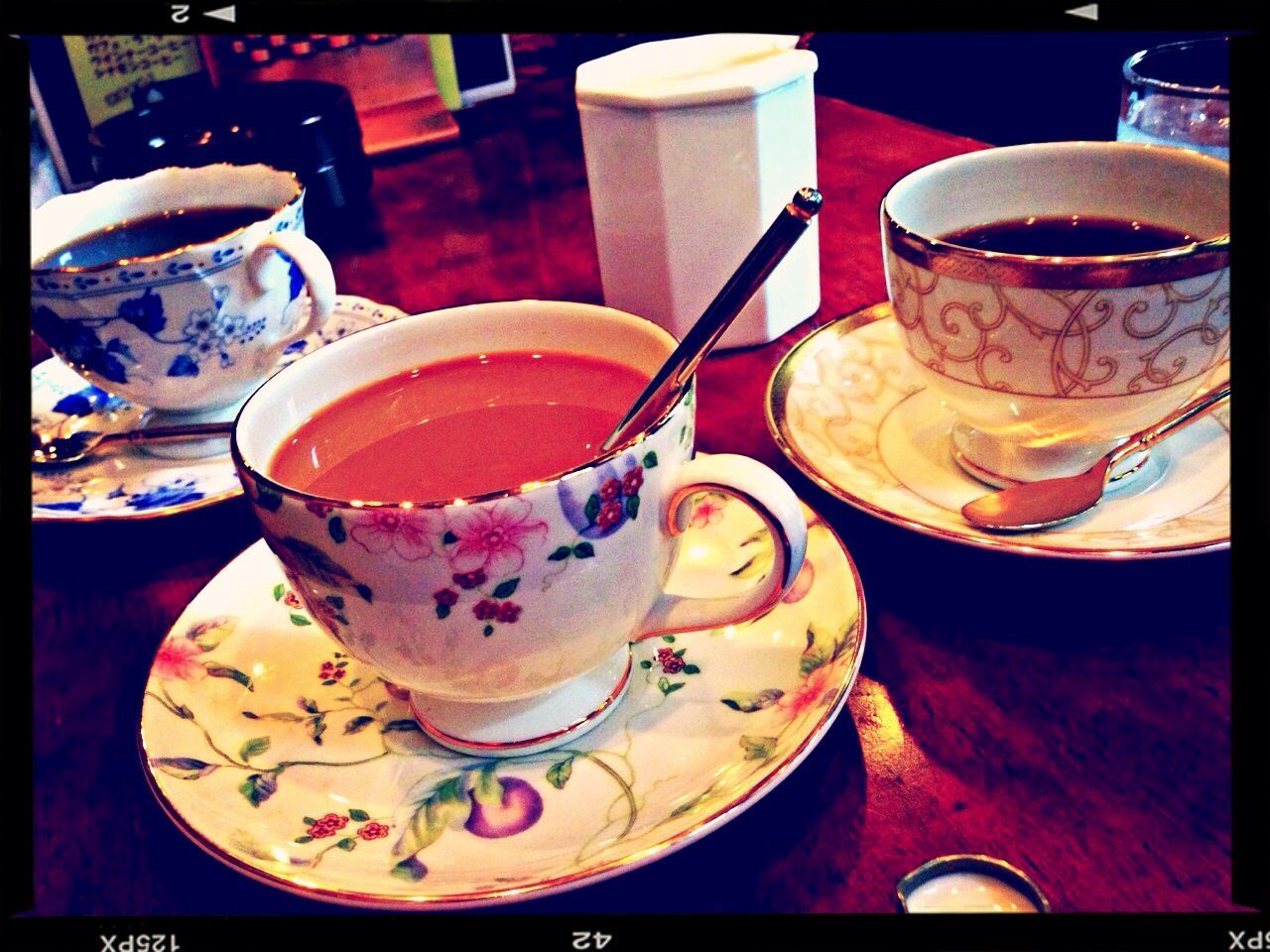 CLOSE-UP OF COFFEE ON TABLE