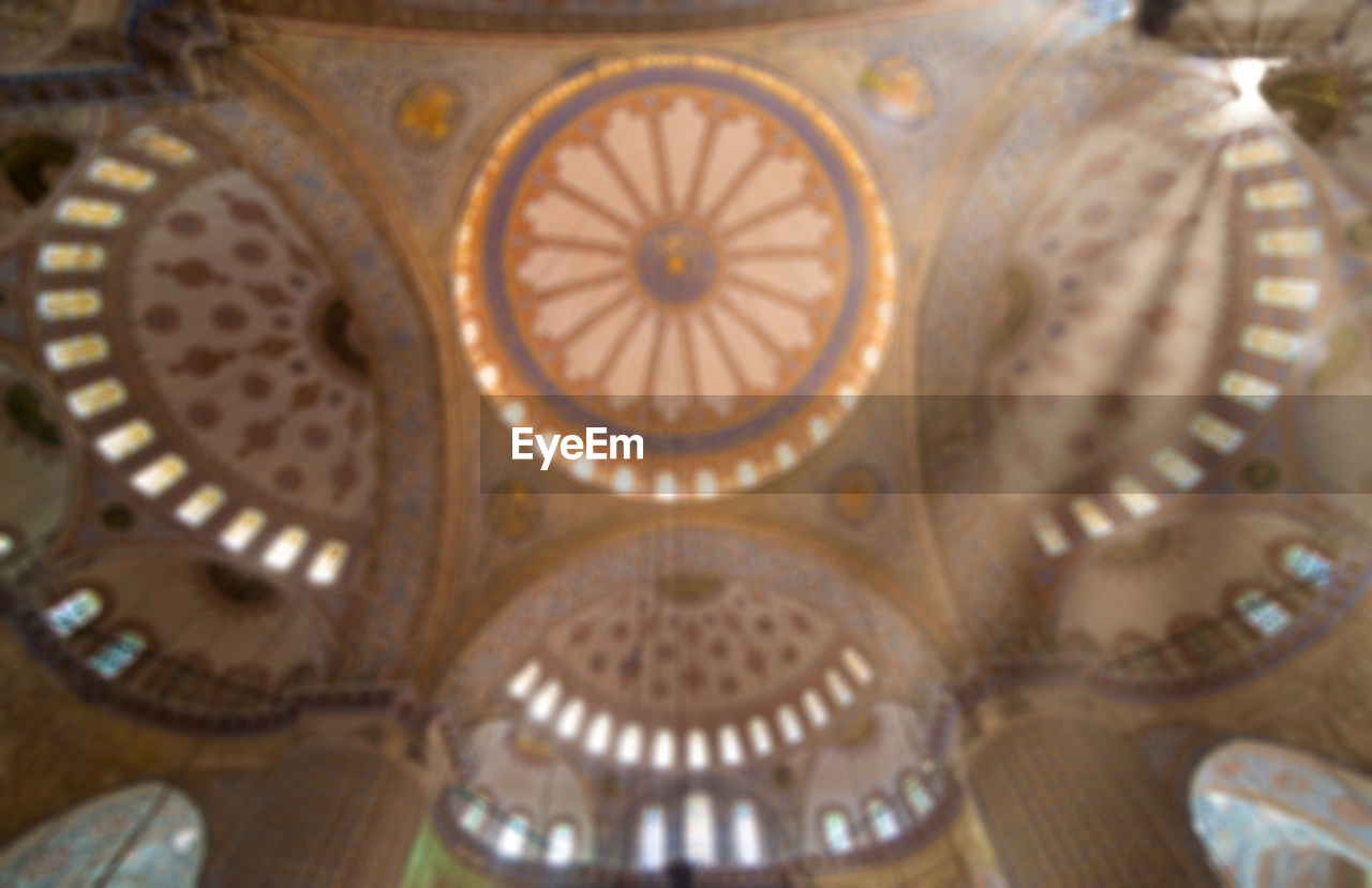 Low angle view and ray of light of sultan ahmet mosque or blue mosque in istanbul, turkey.