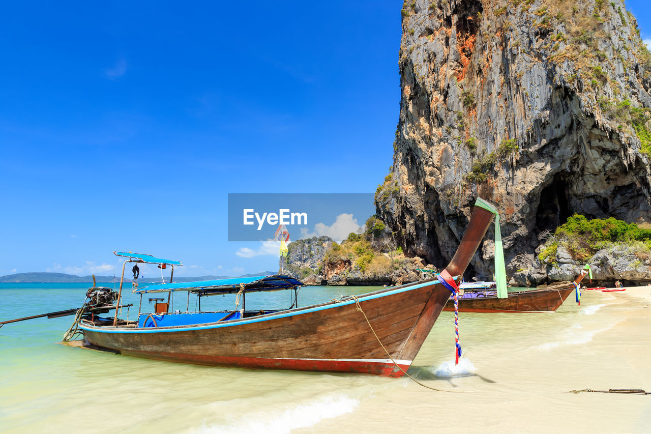 Long tail boat at phra nang beach, krabi, thailand