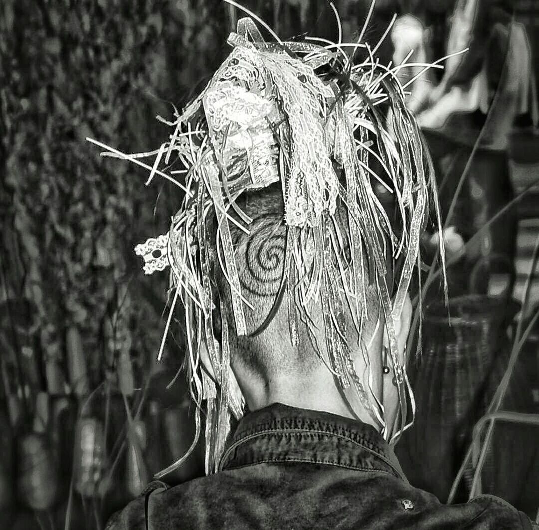 Rear view of man with headdress