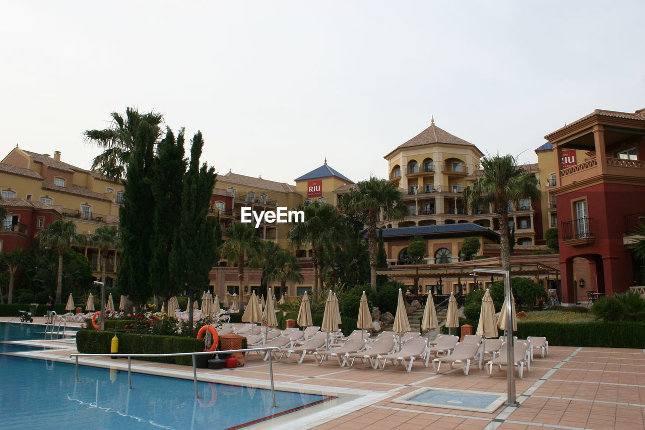 VIEW OF SWIMMING POOL AGAINST SKY