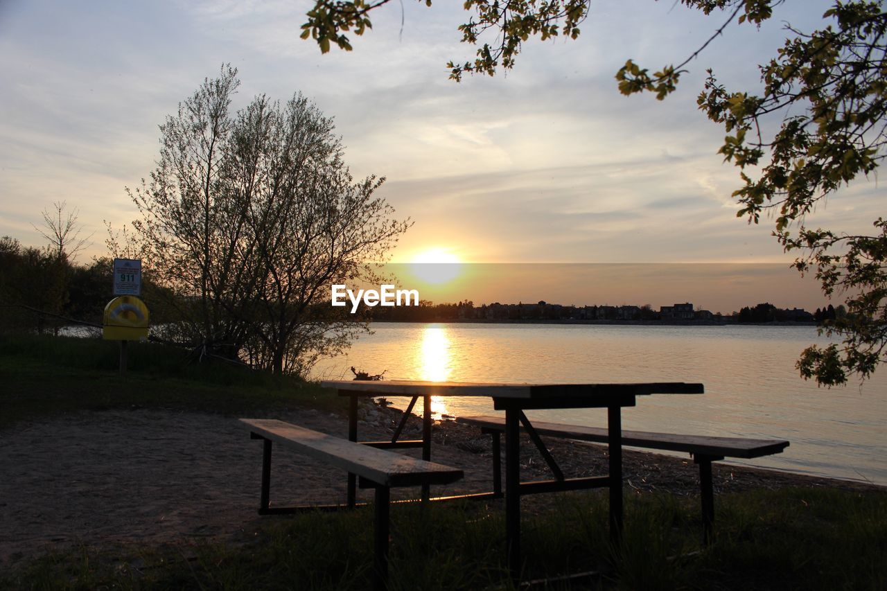 SCENIC VIEW OF SUNSET OVER TREES