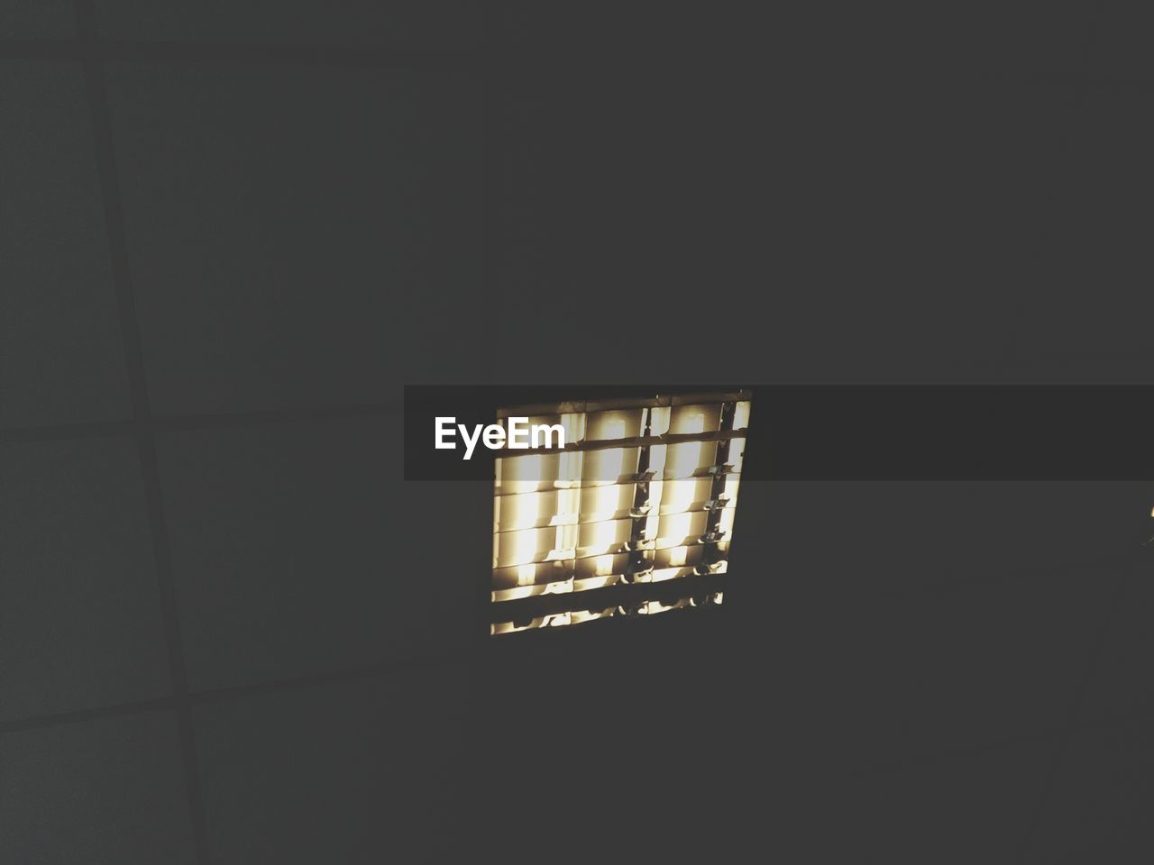 Low angle view of illuminated window