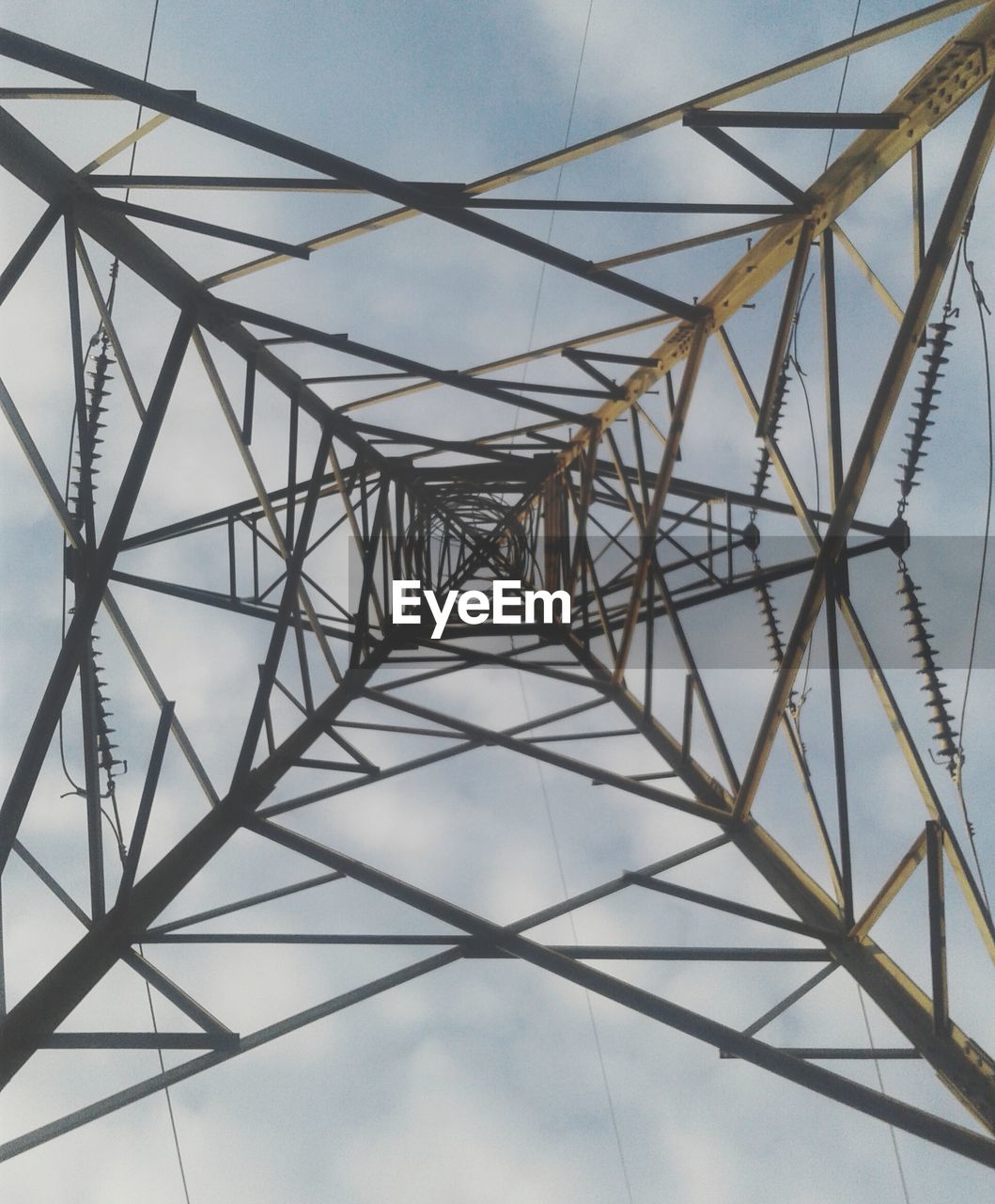 LOW ANGLE VIEW OF POWER LINES AGAINST SKY