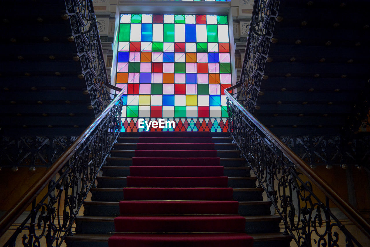 HIGH ANGLE VIEW OF STEPS IN ILLUMINATED BUILDING