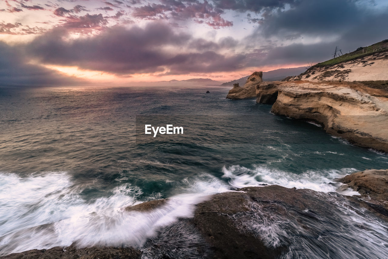 Scenic view of sea against sky during sunset