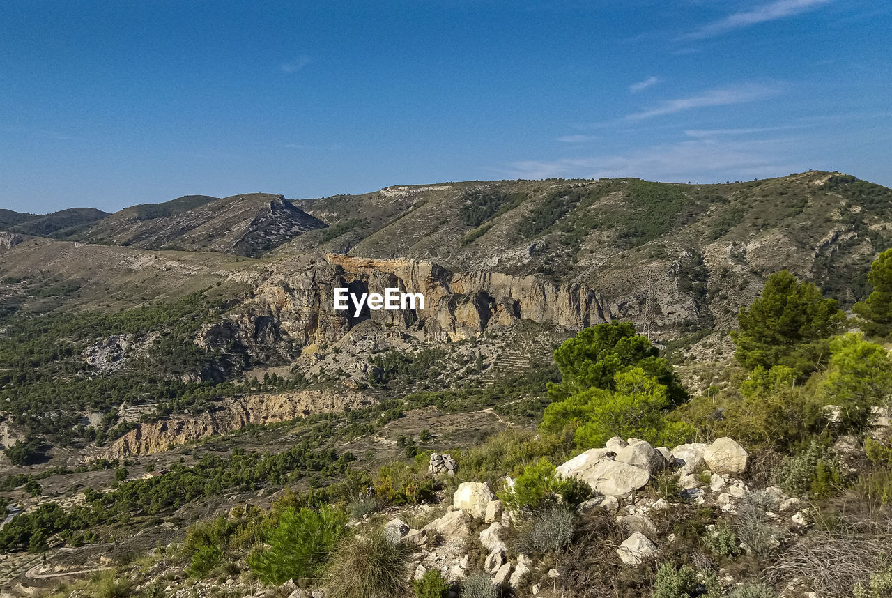 Scenic view of rocky mountains against sky