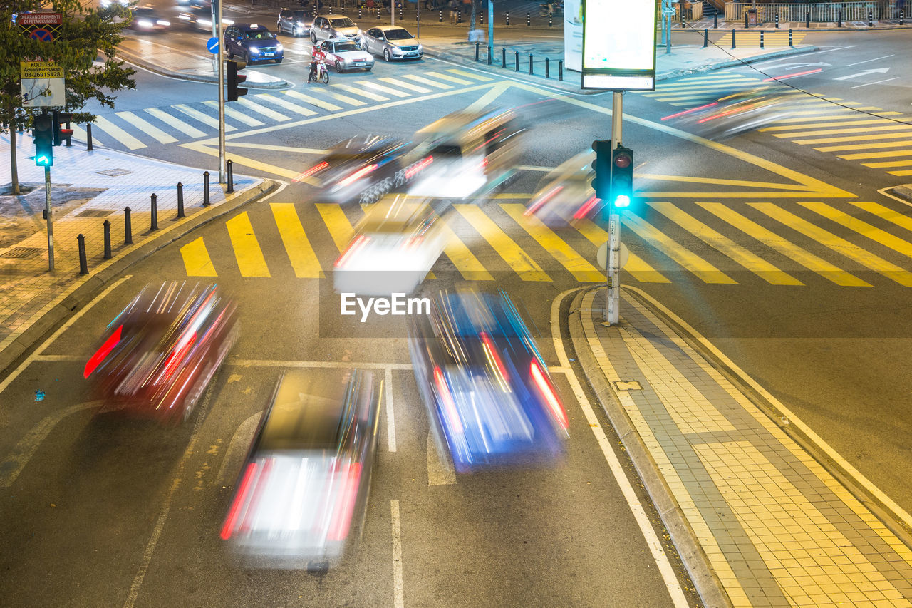 High angle view of light trails on road