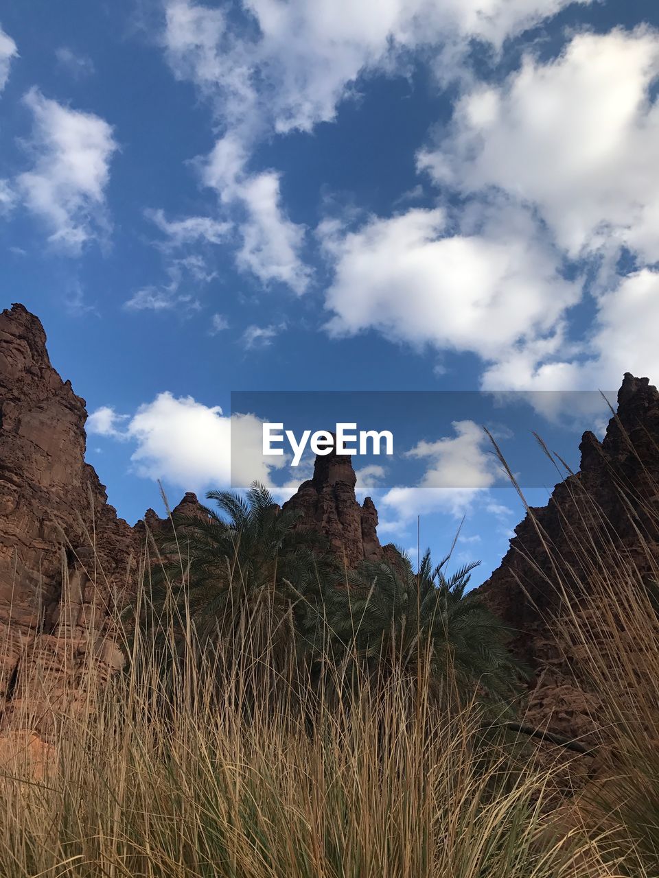 Low angle view of rocks against sky