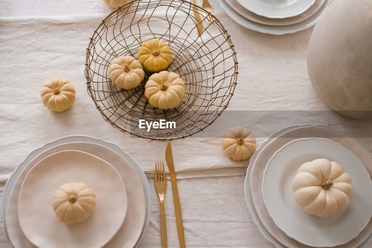 Autumn table setting with pumpkins. decor about thanksgiving