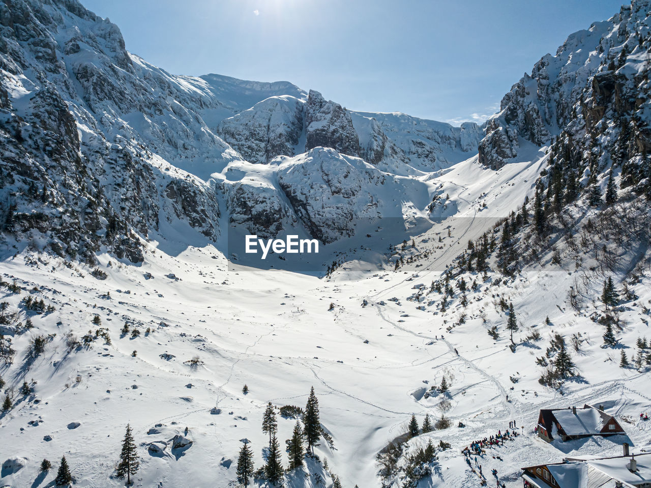 Scenic view of snowcapped mountains against sky