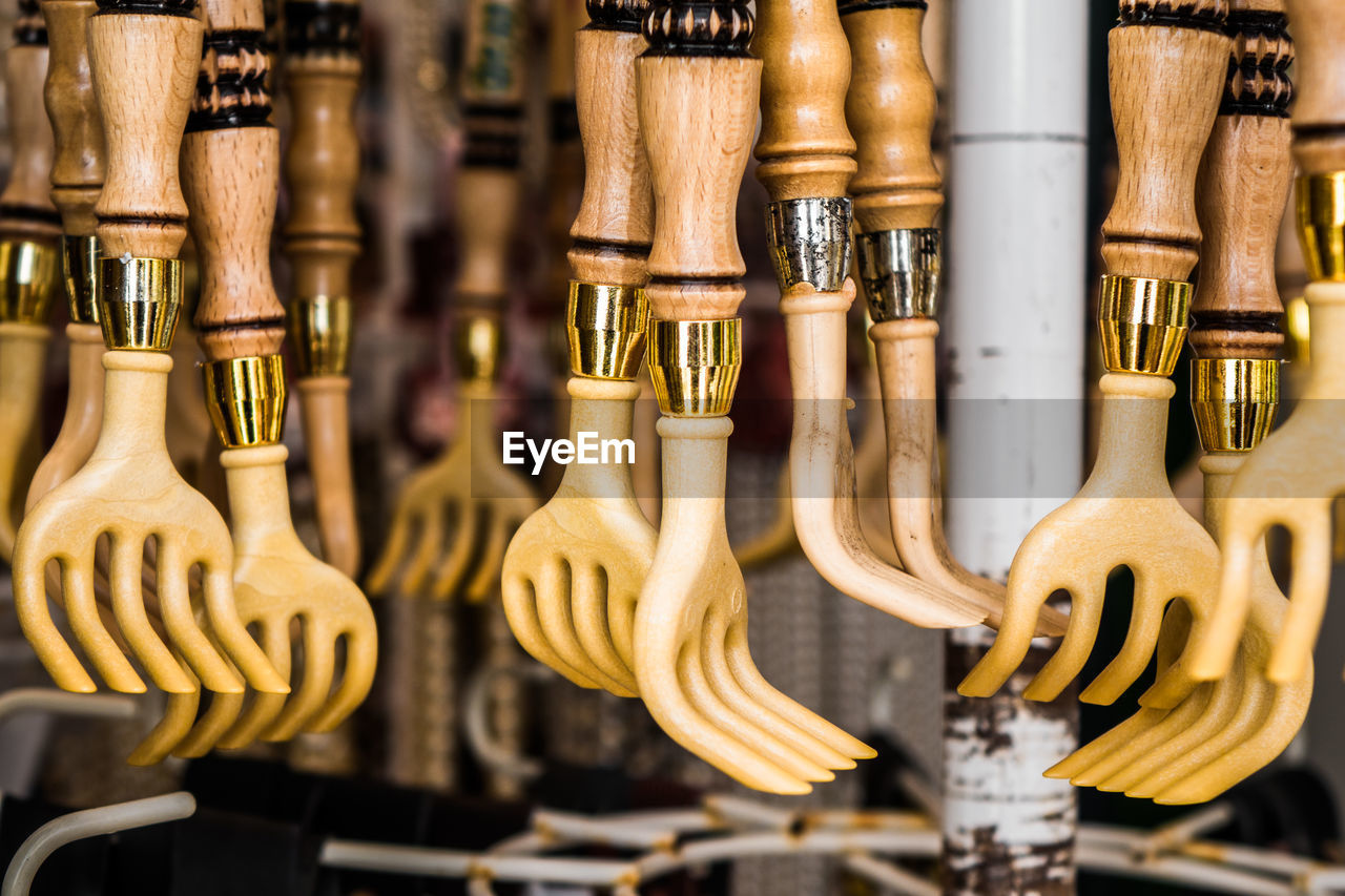 Close-up of forks hanging for sale in store