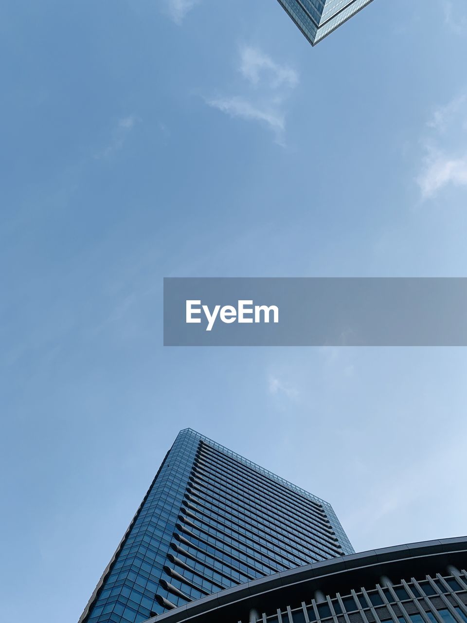 Low angle view of modern building against sky