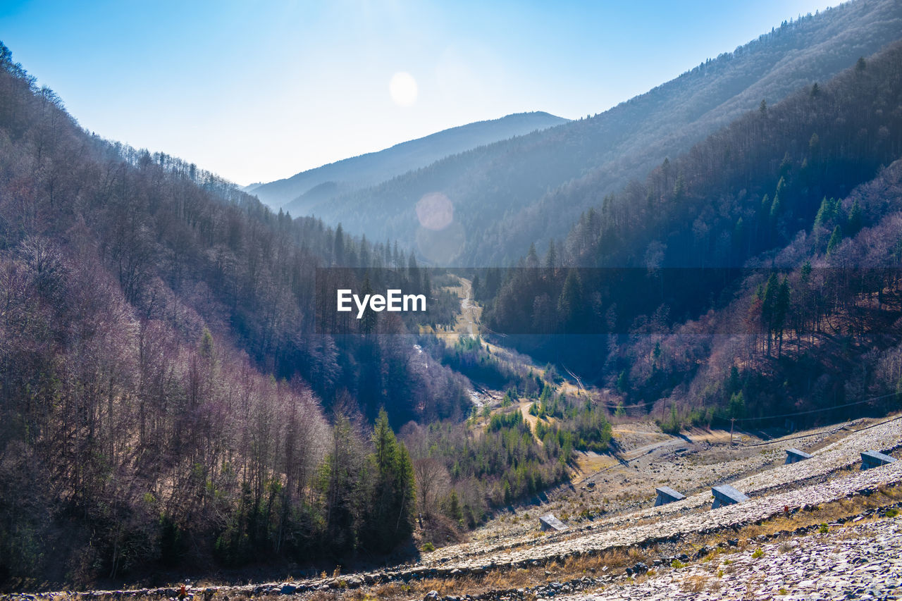 Dramatic aerial photo of a beauiful valley close to the rausor lake and dam in arges, romania.