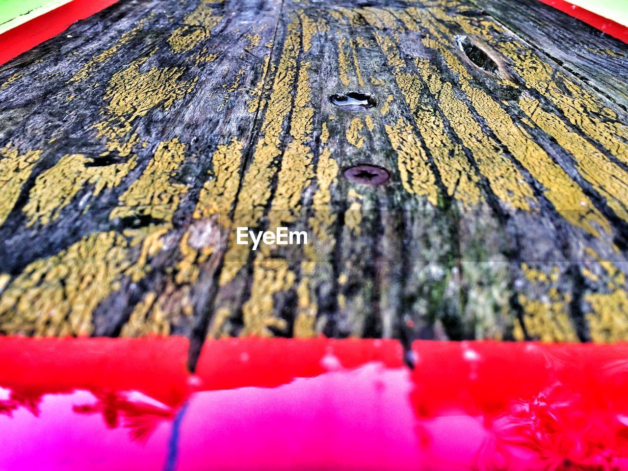 Close-up of old wooden bench