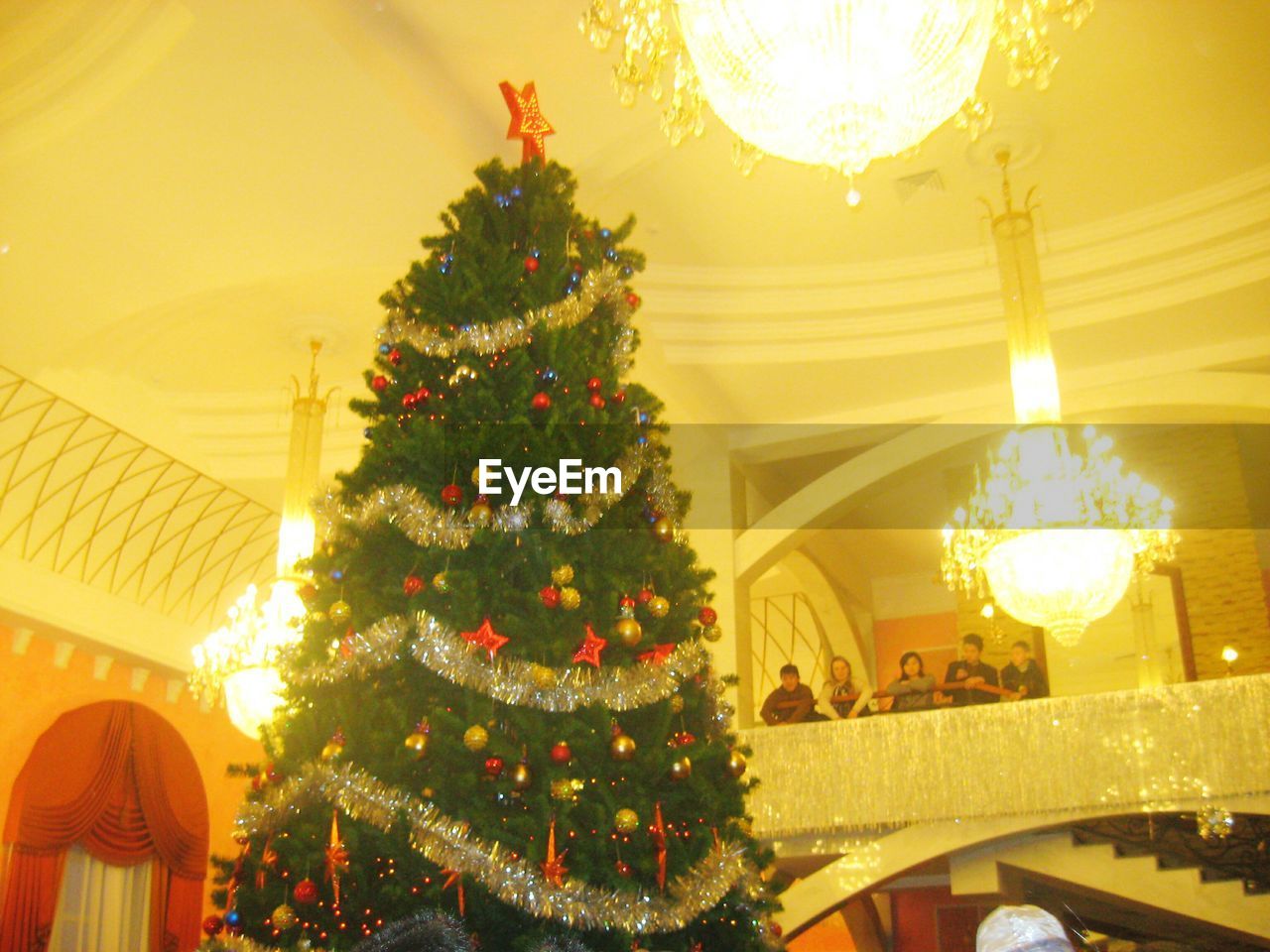 Low angle view of illuminated christmas tree at night