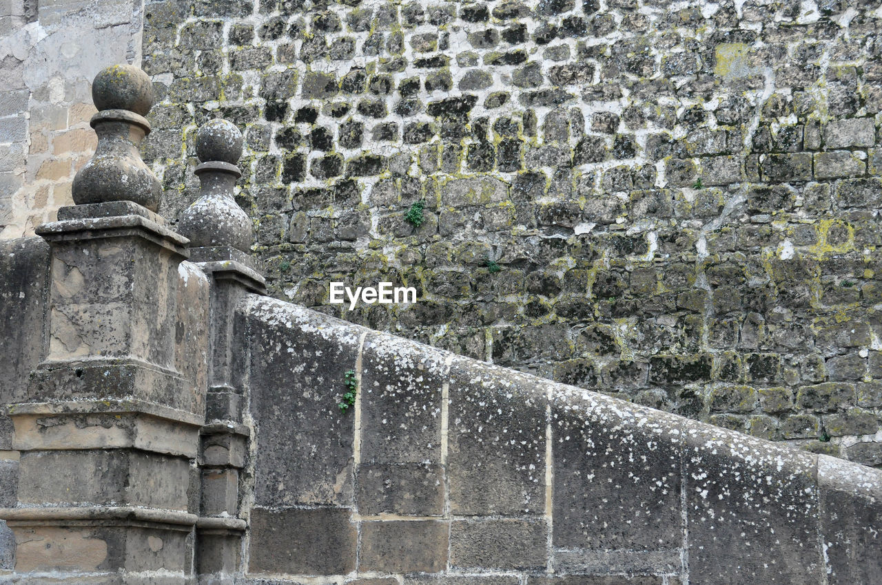 wall, architecture, no people, ancient history, built structure, day, wall - building feature, fountain, sculpture, water, rock, nature, creativity, art, temple, outdoors, history, human representation, the past, stone material, building exterior, statue, representation, ruins, old, pattern, craft, water feature, monument