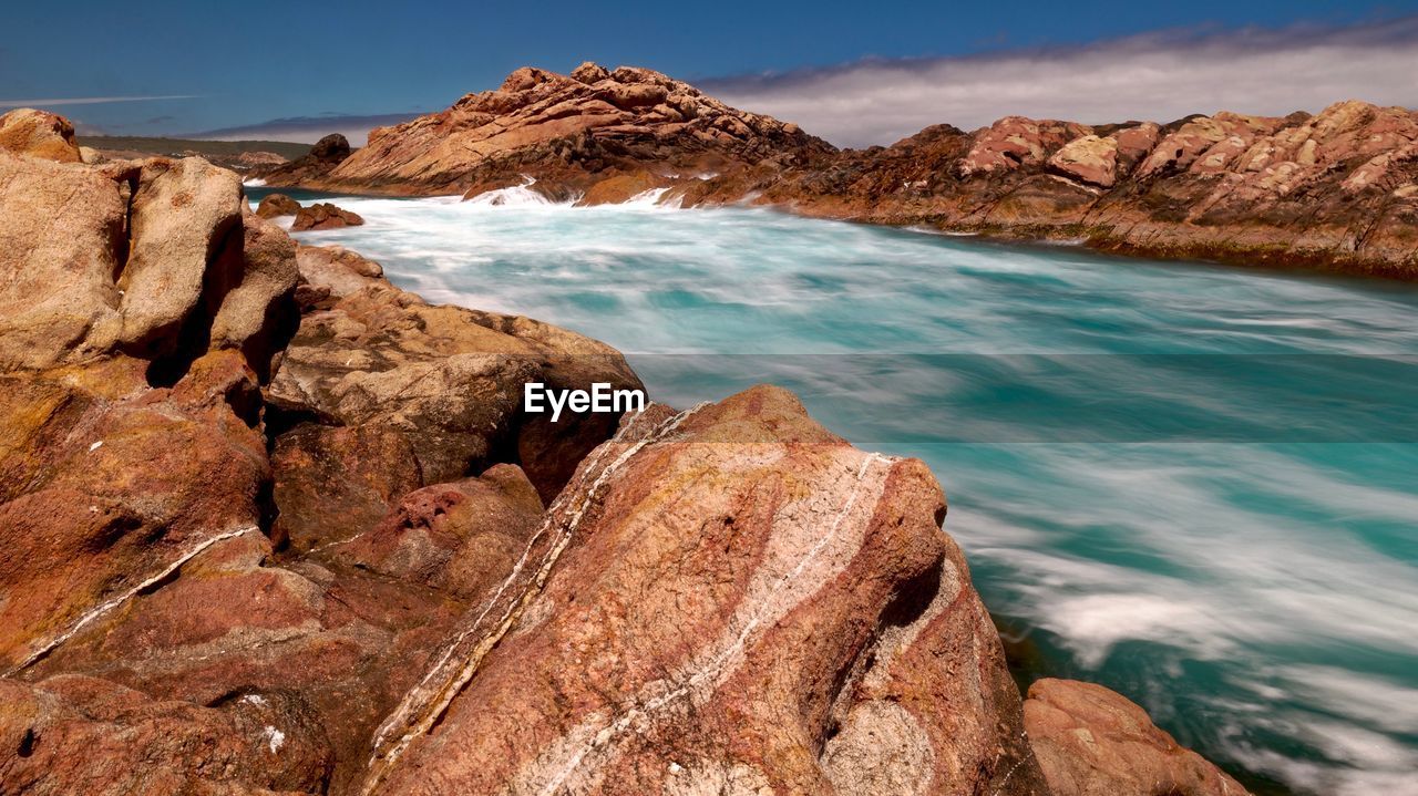 ROCK FORMATIONS ON BEACH