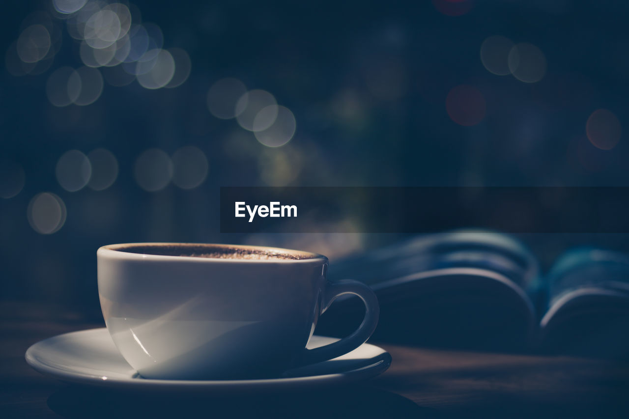 Close-up of coffee cup on table